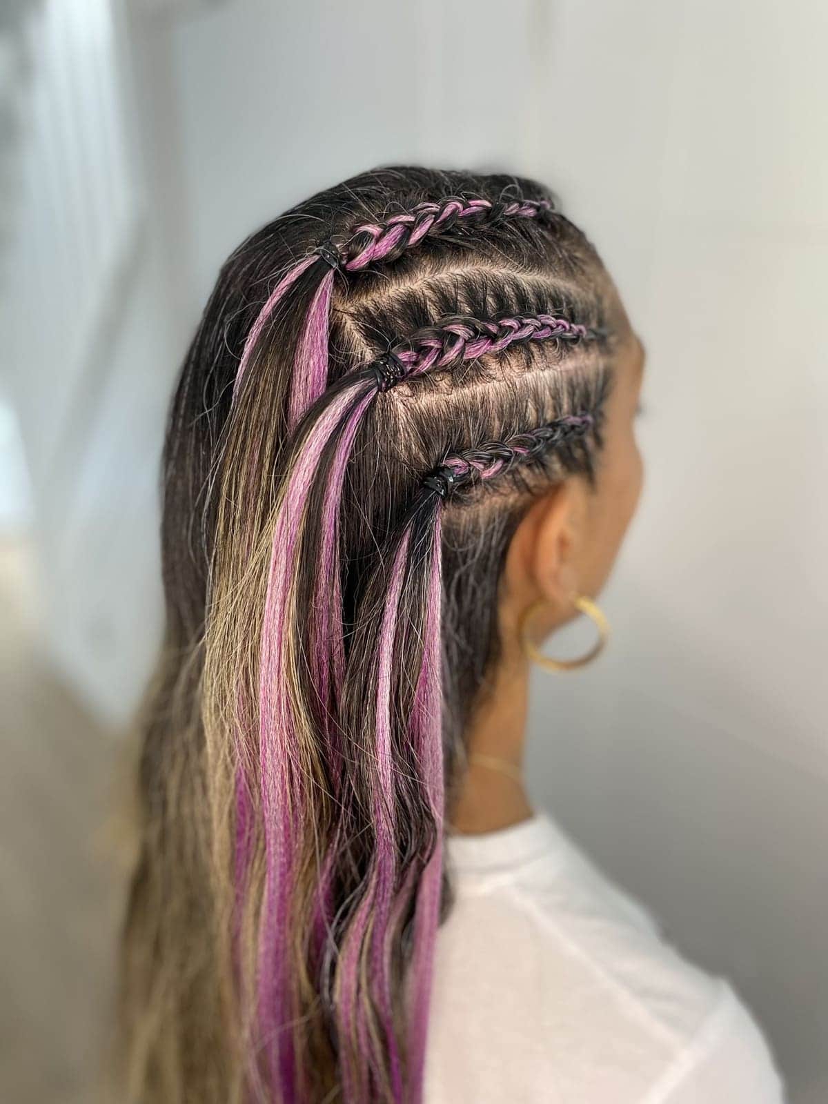 Mini braids with purple streaks